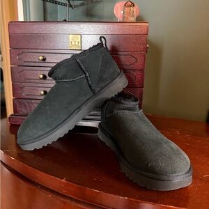 Unworn black UGGs-priced to sell!